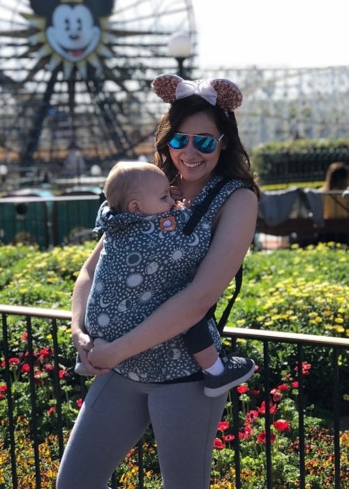 Taylor Dooley as seen while posing for a picture with her son at Disney California Adventure Park in Anaheim, Orange County, California, United States in February 2018