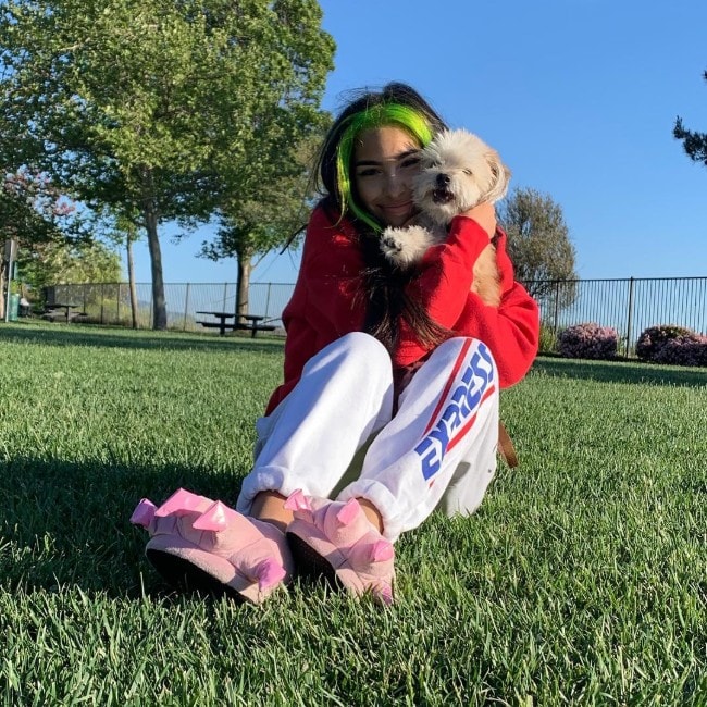 Vereena Sayed with her dog as seen in April 2019