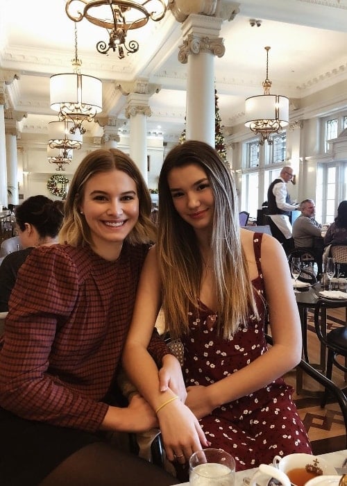 Ali Skovbye (Right) as seen while posing for a picture along with her older sister, Tiera Skovbye, at Hotel Fairmont Empress in Victoria, British Columbia, Canada in December 2018