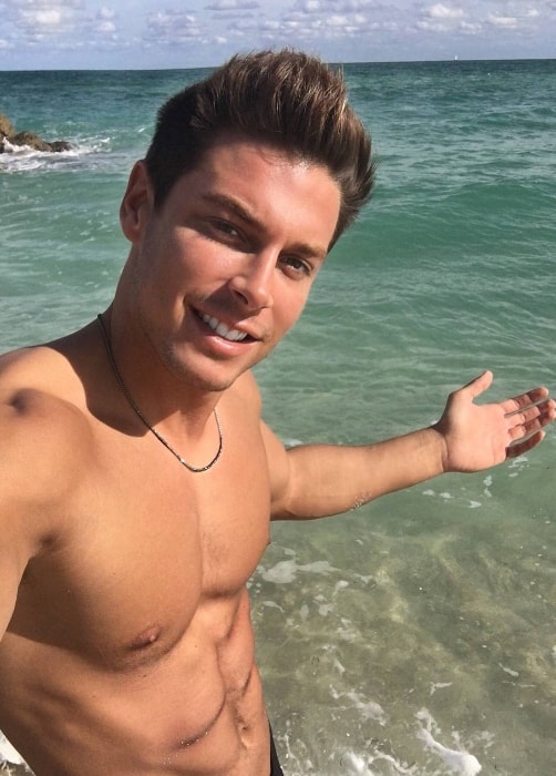 Andrea Denver as seen while taking a shirtless selfie at Miami Beach in Miami-Dade County, Florida, United States in January 2016