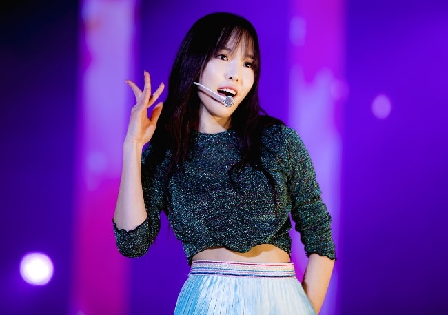 Choi Yu-na (Yuju) as seen while performing during an event in February 2018