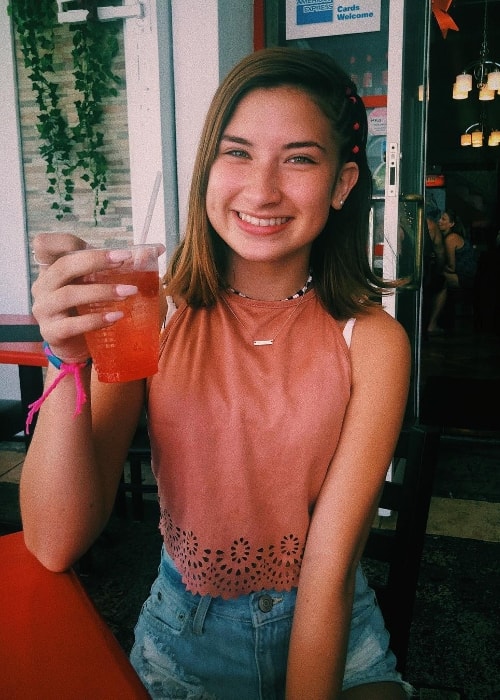 Hannah Rylee as seen while posing for the camera with her drink in Nassau, Bahamas in March 2019