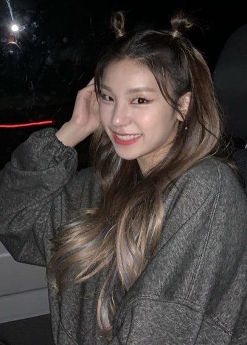 Hwang Ye-ji as seen while smiling for a picture in August 2019