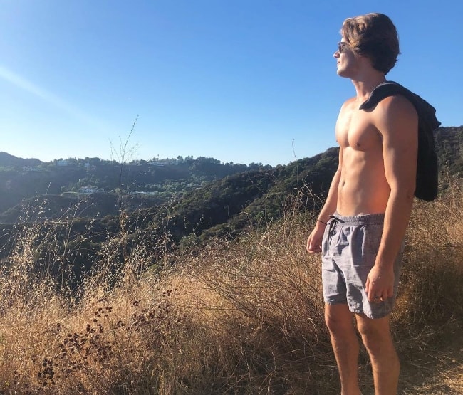 Joel Adams as seen while posing for a stunning shirtless picture during a hike at Franklin Canyon Park in Los Angeles, California, United States in September 2018