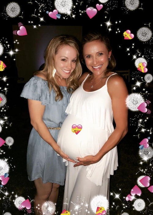 Kelly Stables (Left) as seen while posing for the camera along with Christine Lakin and her baby bump in September 2018
