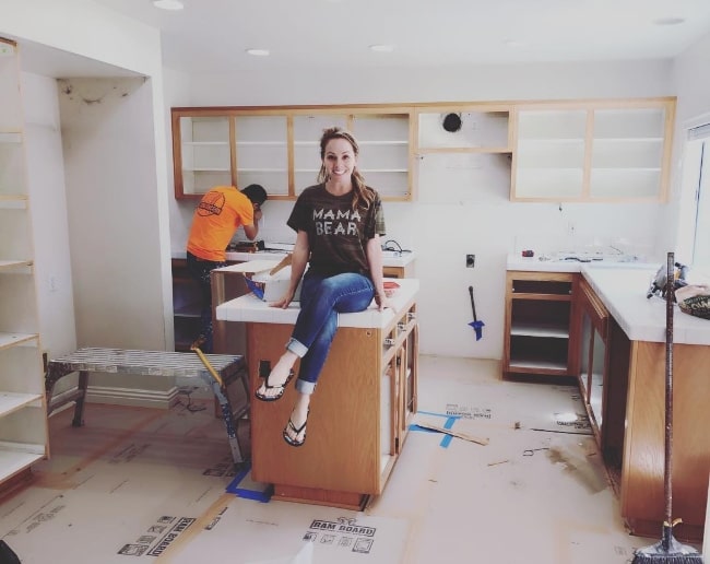 Kelly Stables as seen while smiling nervously for a picture as her kitchen was being remodeled in April 2018