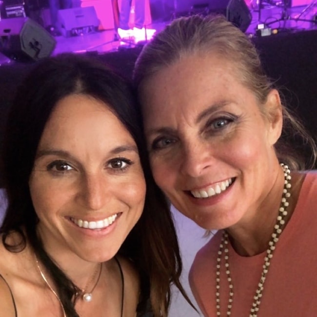 Kim Alexis (Right) as seen while posing alongside Liliana Burgi at the CASA Kane Country event in May 2018