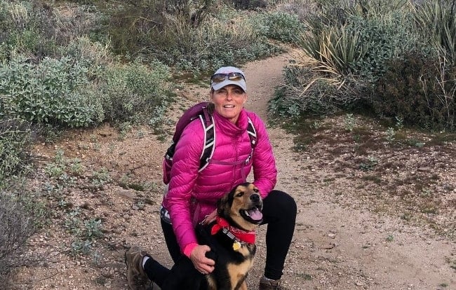 Kim Alexis as seen while posing for a picture during a hike along with her rescue dog named Stump in January 2019