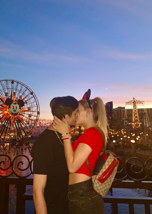 Madi Monroe as seen in a picture taken while sharing a rather priceless moment with her beau Christopher Romero at Disneyland in August 2019