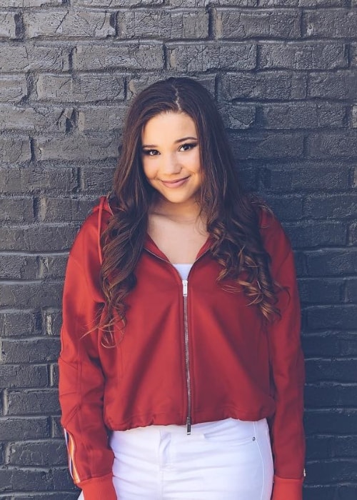 Madison Haschak as seen while smiling in a picture taken in March 2019