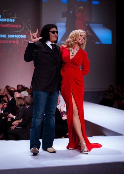 Shannon Tweed as seen in a picture with her husband Gene Simmons while walking the ramp at the Heart and Stroke Foundation's The Heart Truth celebrity fashion show in March 2012