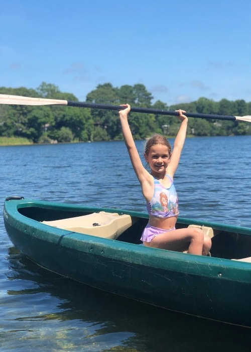 Tilly Mills as seen while posing for the camera holding an oar in Cape Cod in Massachusetts, United States in August 2019