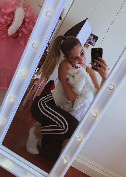 Virginia Montemaggi as seen while taking a mirror selfie with a dog in December 2018