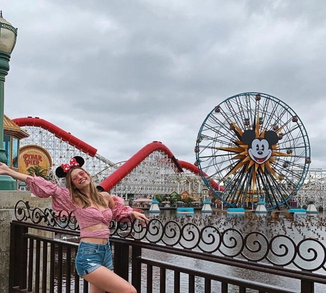 Afra Saraçoğlu as seen while posing for a picture at Disney California Adventure Park in Anaheim, California, United States in July 2019