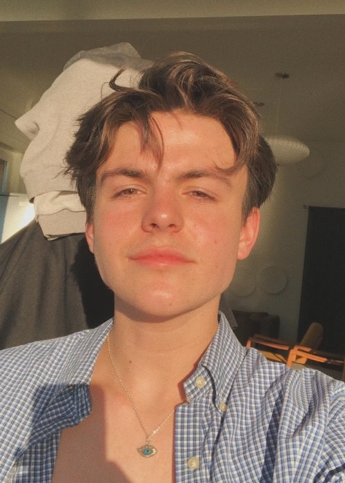 Blake Richardson as seen while taking a sun-kissed selfie at Lago Maggiore located on the south side of the Alps in January 2019