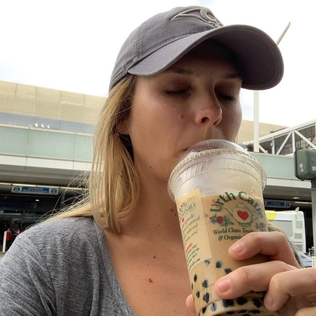 Cassandra Jean as seen while taking a selfie along with her drink at Los Angeles International Airport in California, United States in September 2019