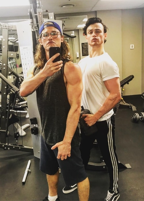 Dylan Playfair as seen while clicking a goofy gym mirror selfie alongside Thomas Doherty in June 2018