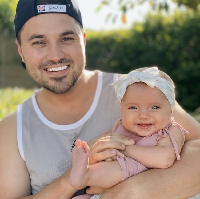Halston Blake Fisher as seen while smiling in a picture with her father, Kyler Fisher, in July 2019