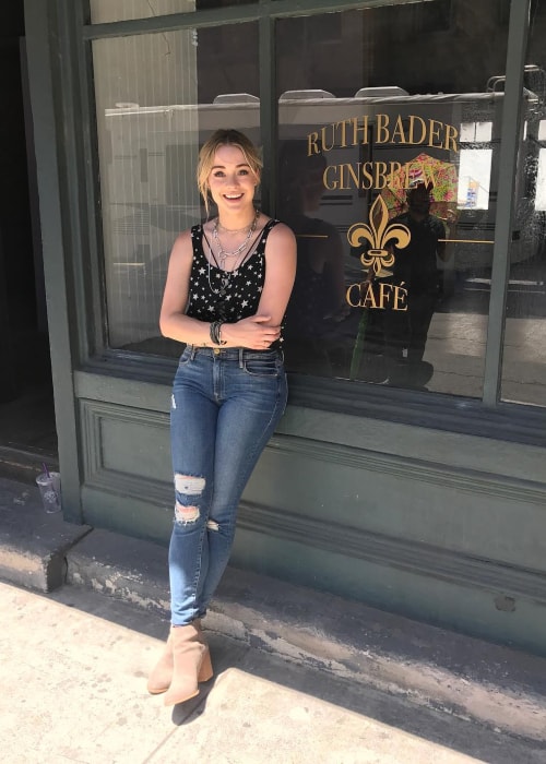 Hannah Kasulka as seen in a picture taken in front of a Ruth Bader Ginsbrew Cafe in June 2017