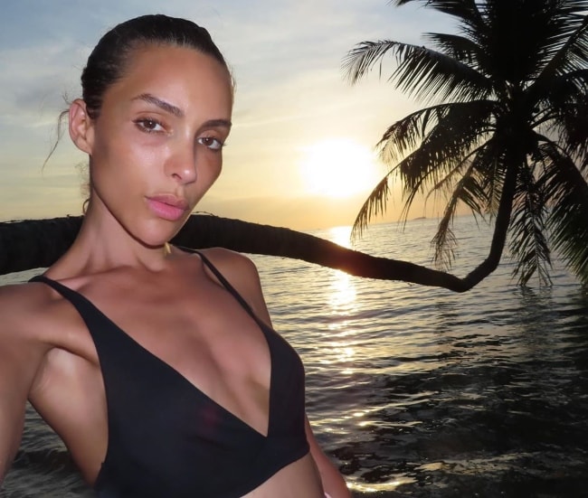 Ines Rau as seen while taking a selfie with a beautiful backdrop at Secret Beach Koh Phangan in August 2019