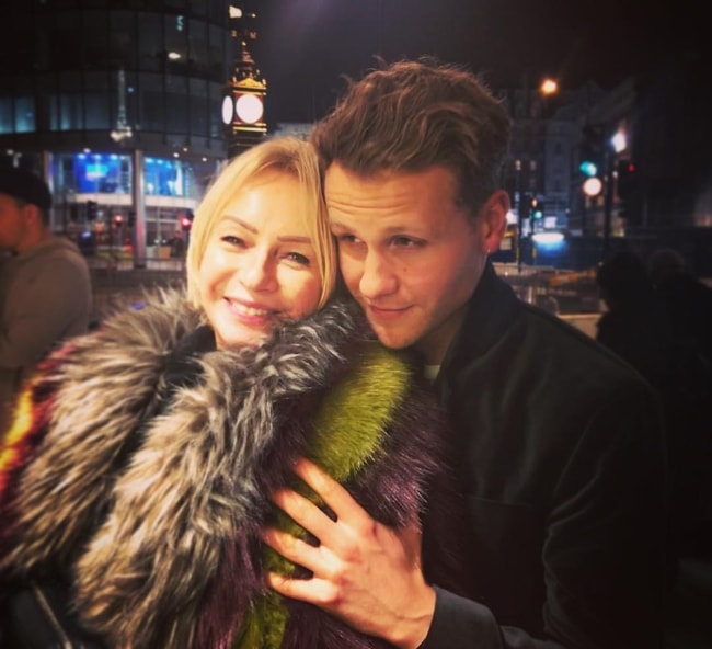 Josh Dylan as seen while posing for a picture along with Judy Craymer at the opening of the 'Hamilton' musical at Victoria Palace Theatre in London, England, United Kingdom in December 2017