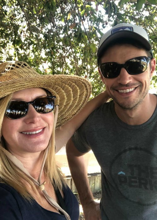 Joshua Snyder and Angela Kinsey in a selfie as seen in October 2019