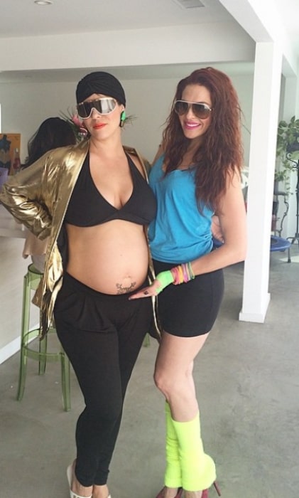 Julie Mond as seen while posing for a picture along with pregnant Betsy Metal flaunting her baby bump in April 2015