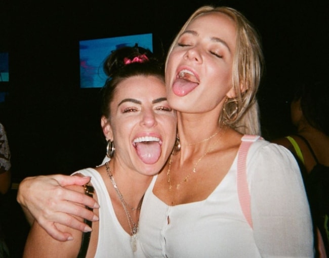 Kylie Rae Hall (Left) as seen while posing for a goofy picture along with Crystal Leigh at Hangout Music Festival in Alabama, United States in May 2019