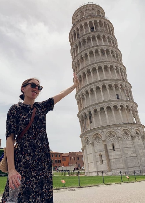 María Valverde as seen while posing for a fun picture with the Leaning Tower of Pisa in Pisa, Tuscany, Italy in June 2019