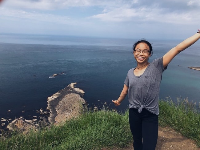 Morgan Hurd as seen while posing for a picture at the Giant's Causeway located in County Antrim, Northern Ireland in July 2019