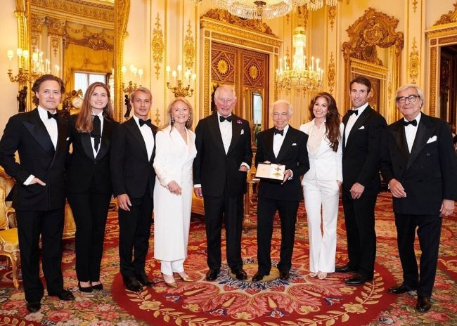 Ralph Lauren pictured with his family and Prince Charles after receiving an Honorary Knighthood in 2019