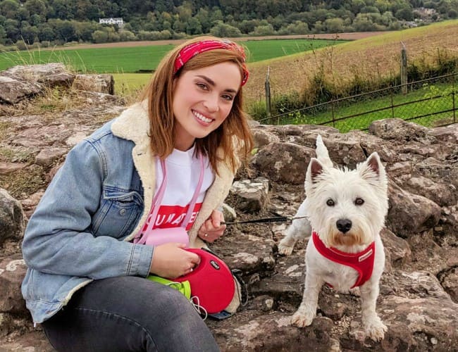 Rose Ellen Dix with her dog as seen in October 2018