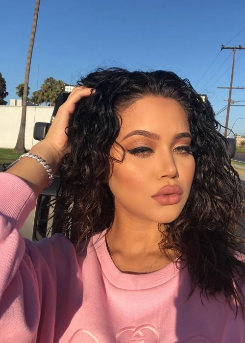 Shyla Walker as seen in a glammed-up sun-kissed picture in August 2019
