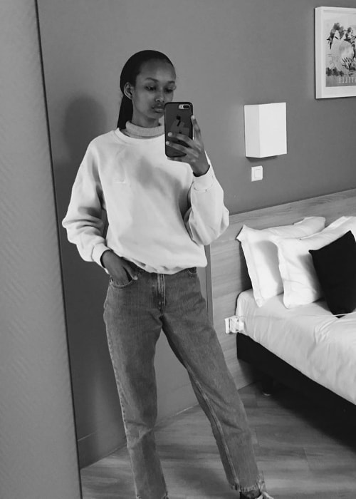 Ugbad Abdi as seen while taking a black-and-white mirror selfie in her room in February 2019