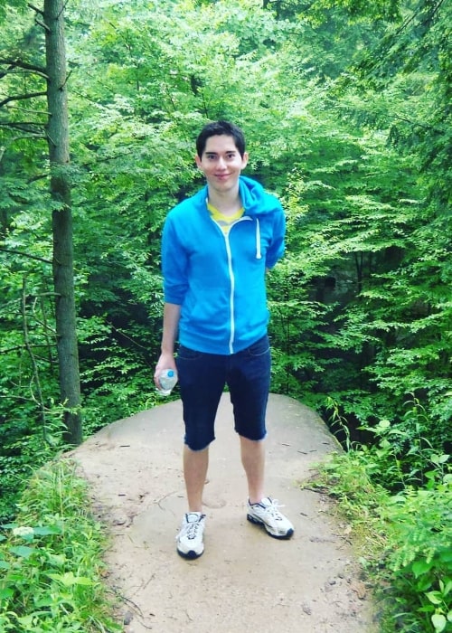 Adam Mardel as seen while posing for a picture amidst nature during his younger years