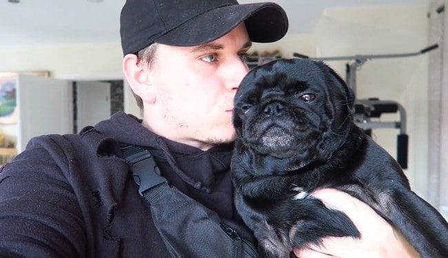 AshDubh with his dog as seen in August 2019