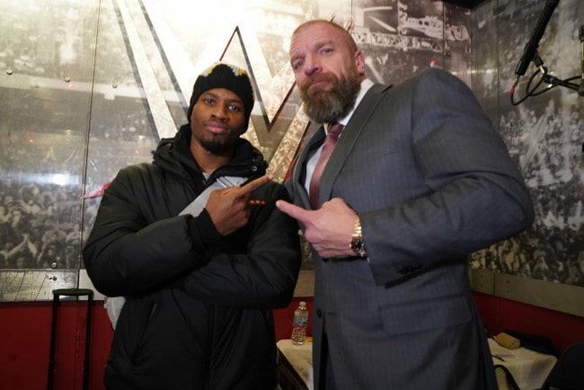 Denzel Curry (Left) and Triple H as seen in November 2019