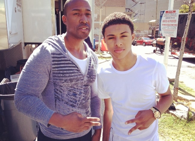 Diggy Simmons (Right) as seen while posing for a picture in June 2013