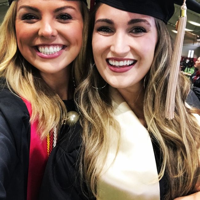 Hannah Brown seen with Carlie Parrish during their graduation from the University of Alabama in August 2017