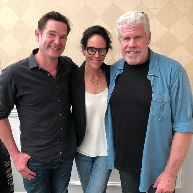 Henry Thomas (Left) as seen while posing for a picture along with Annabeth Gish and Ron Perlman