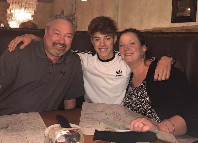 Jeremy Hutchins as seen while posing for a picture along with his parents in January 2019