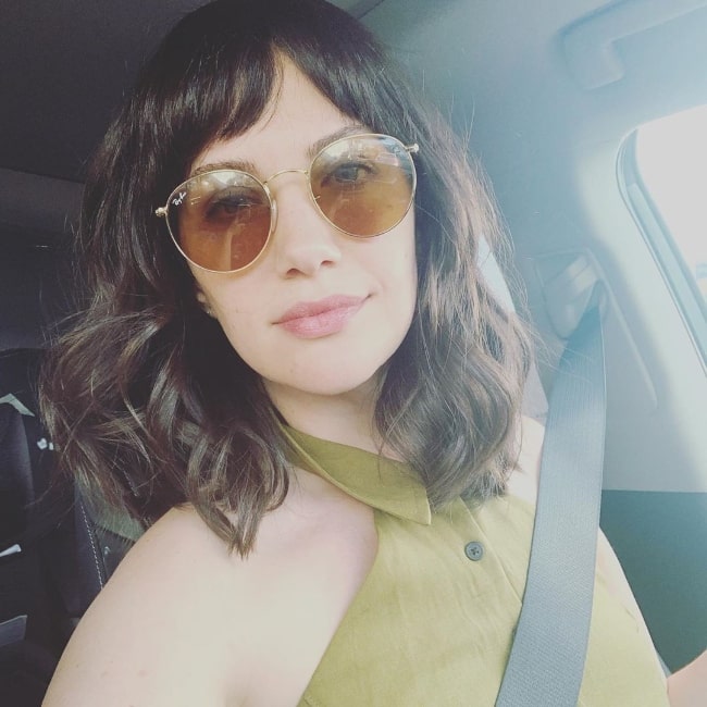 Kate Siegel as seen while taking a car selfie and showing her forehead bangs in July 2019
