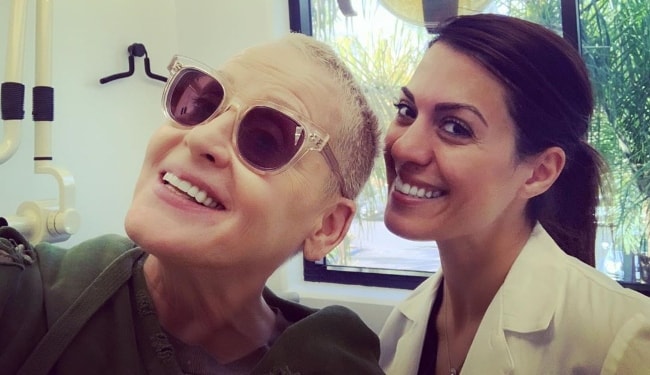 Lori Petty as seen while clicking a selfie with her dentist at SmileOn Dentistry in Marina del Rey, Los Angeles County, California, United States in November 2019