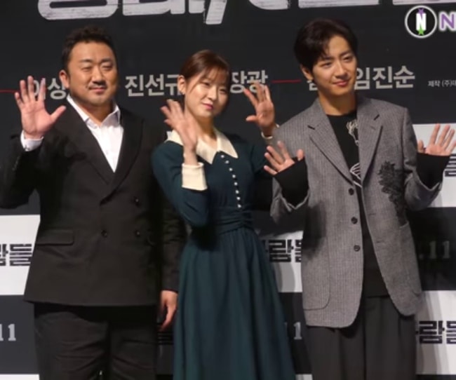 Ma Dong-seok (Left) as seen while posing for a picture along with Kim Sae-ron and Lee Sang-yeob (Right) in October 2018