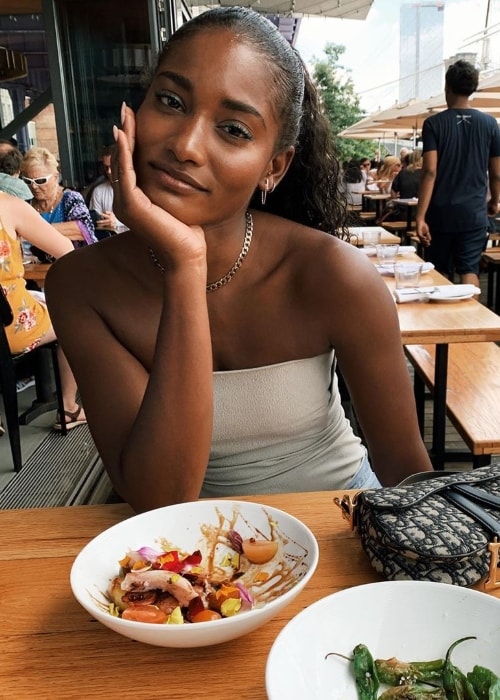 Melodie Monrose as seen while posing for a picture along with her food in Manhattan, New York, United States in July 2019