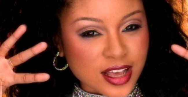 Natina Reed in a still from the music video of the 1999 song I Do