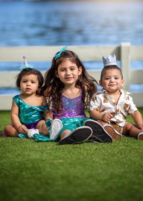 Penelope Juliette with her twin brother and sister