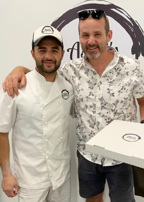 Ryan Moloney (Right) at Asari’s Pizzeria in March 2019
