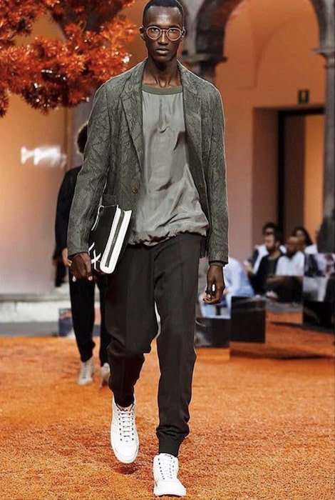 Yannick Bandora walking during Milan Fashion Show for Ermenegildo Zegna in 2017