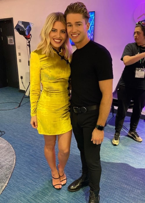 AJ Pritchard as seen in a picture taken with singer and songwriter Mollie King in London, England, United Kingdom in November 2019